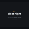 The same sign after dark — front lit LED, warm white