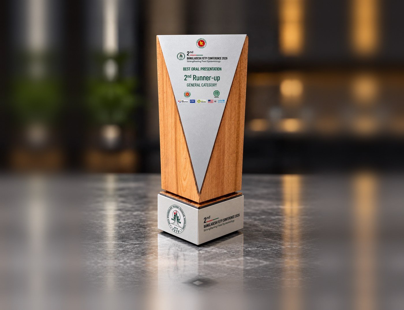 Wooden crest for the Bangladesh FETP Conference 2026, made by Custom Makory